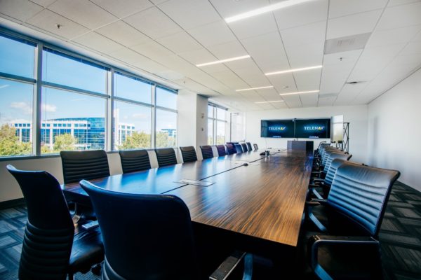 FaciliCorp manages design and construction of modern board room for Telenav in Silicon Valley